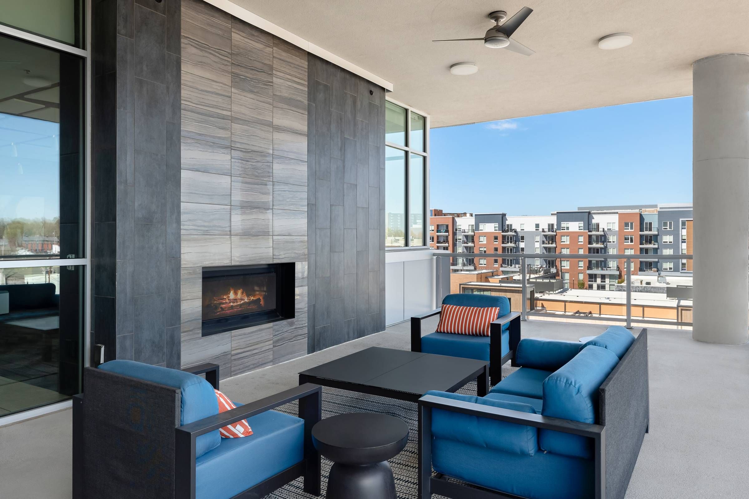 Avenue 80 apartments in Overland, KS fireside rooftop lounge resident amenity.
